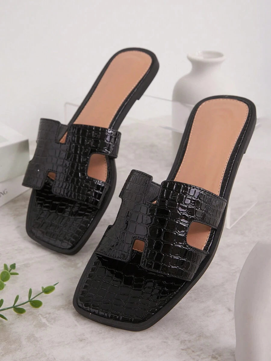 Luxe-inspirerade vita slides med sele