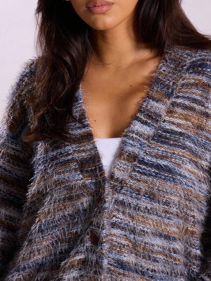 Oversized texturerad cardigan med ränder