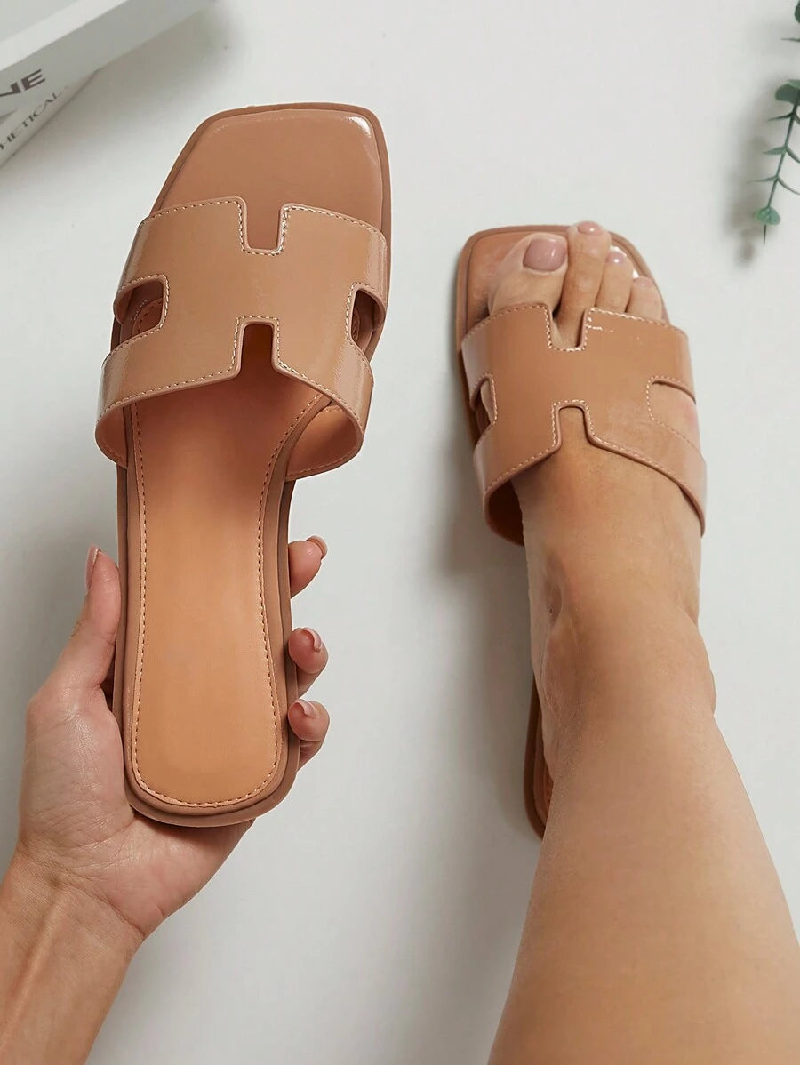 Luxe-inspirerade vita slides med sele