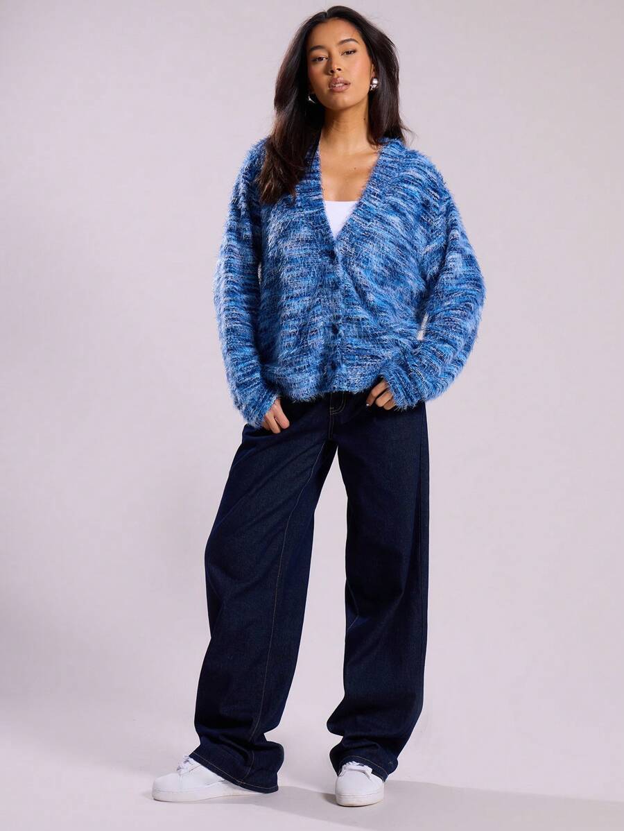 Oversized texturerad cardigan med ränder