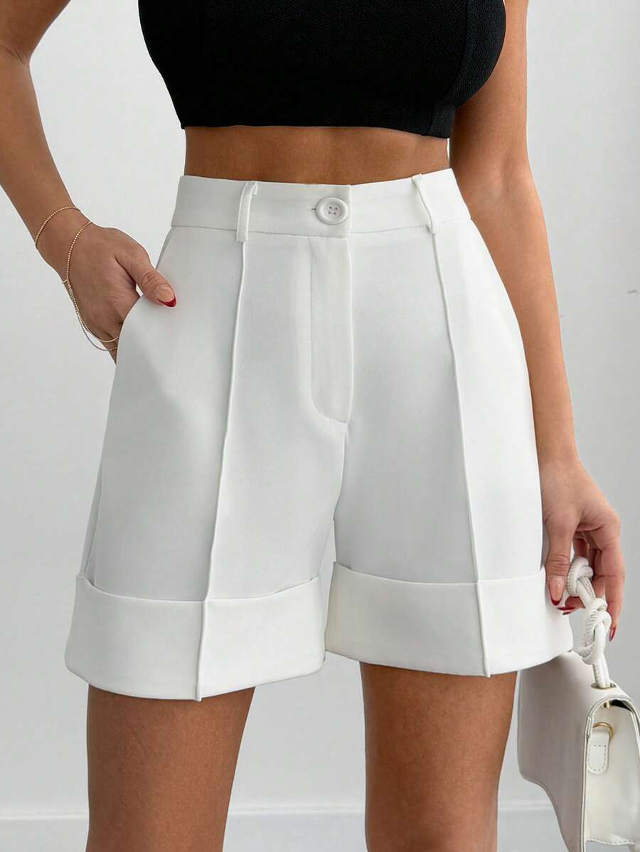 Skräddarsydda midjeshorts med detaljsöm