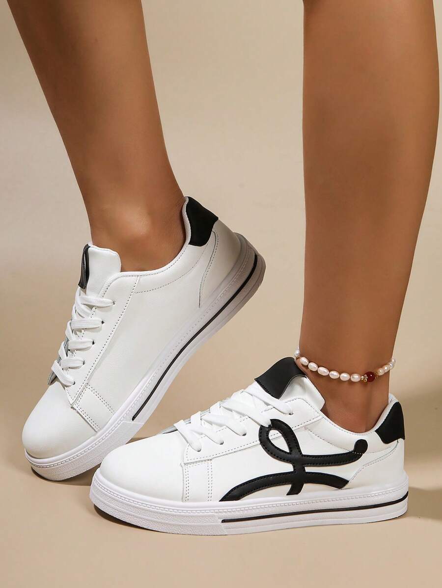 Låga vita sportskor – dam