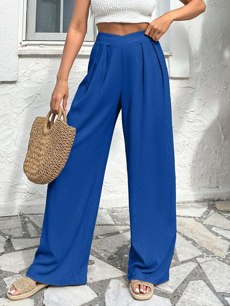 Stilrena byxor med asymmetrisk midja