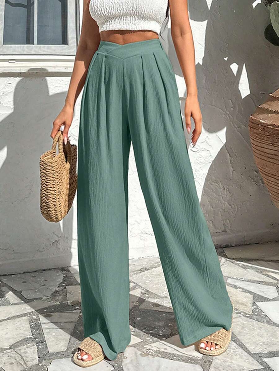 Stilrena byxor med asymmetrisk midja