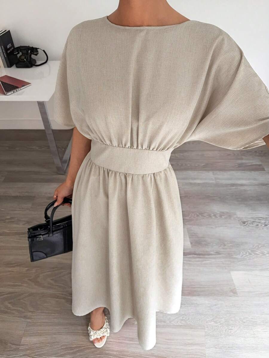 Midjeband Klänning med Fladdermusärm