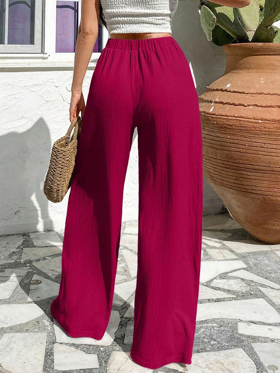 Stilrena byxor med asymmetrisk midja