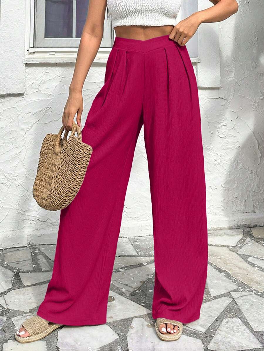 Stilrena byxor med asymmetrisk midja