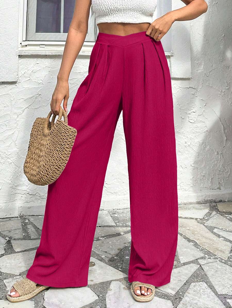 Stilrena byxor med asymmetrisk midja