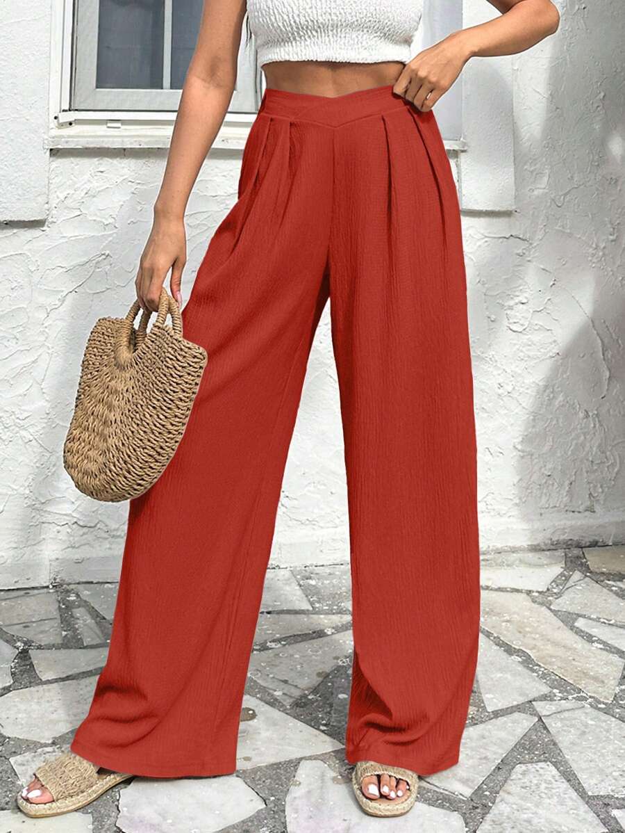 Stilrena byxor med asymmetrisk midja