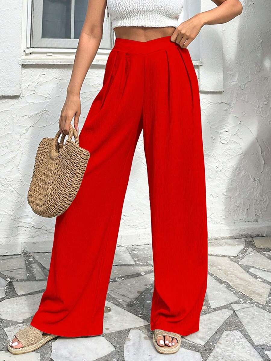 Stilrena byxor med asymmetrisk midja