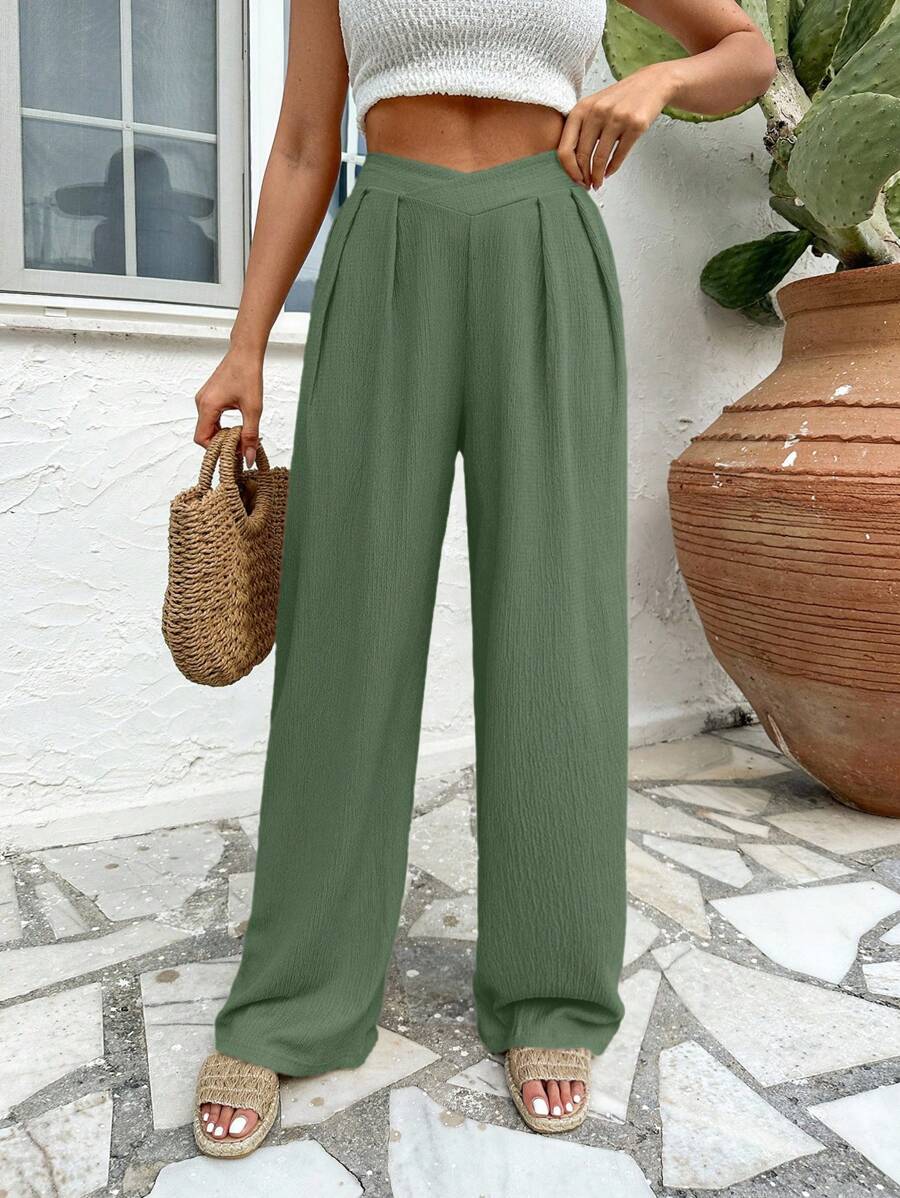 Stilrena byxor med asymmetrisk midja