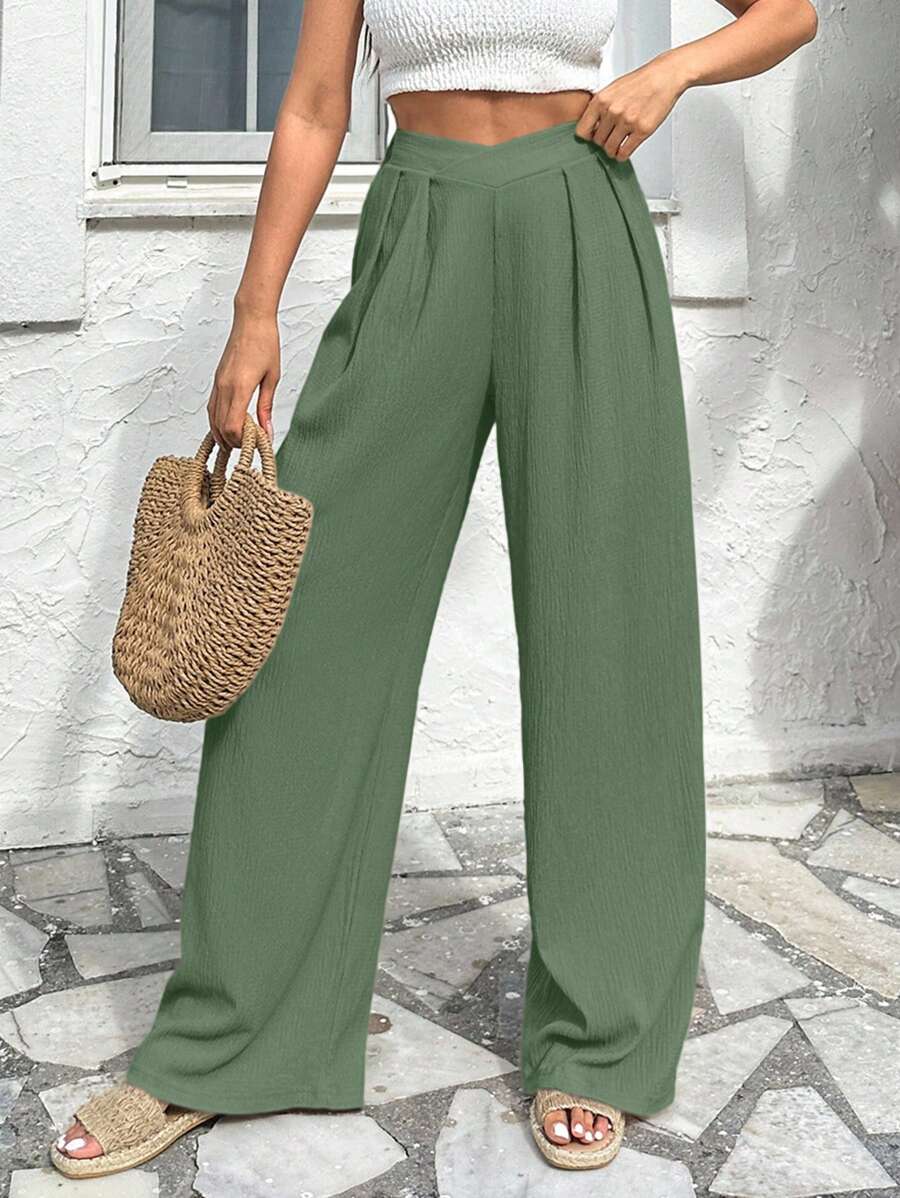 Stilrena byxor med asymmetrisk midja