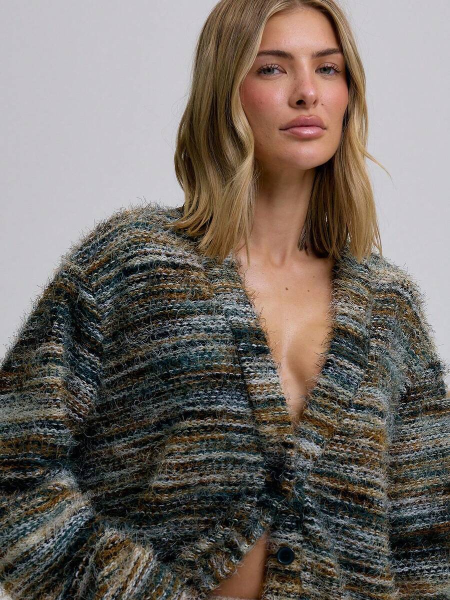 Oversized texturerad cardigan med ränder