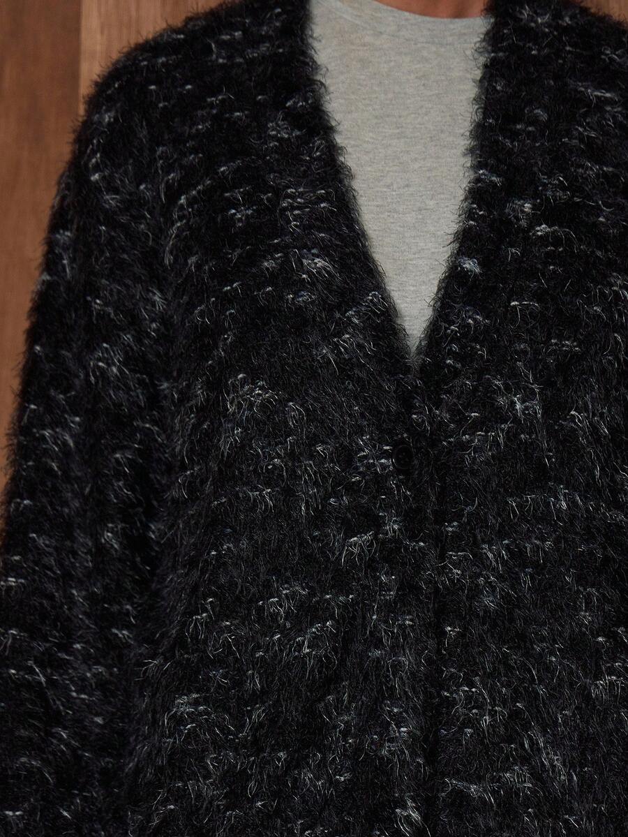 Oversized texturerad cardigan med ränder